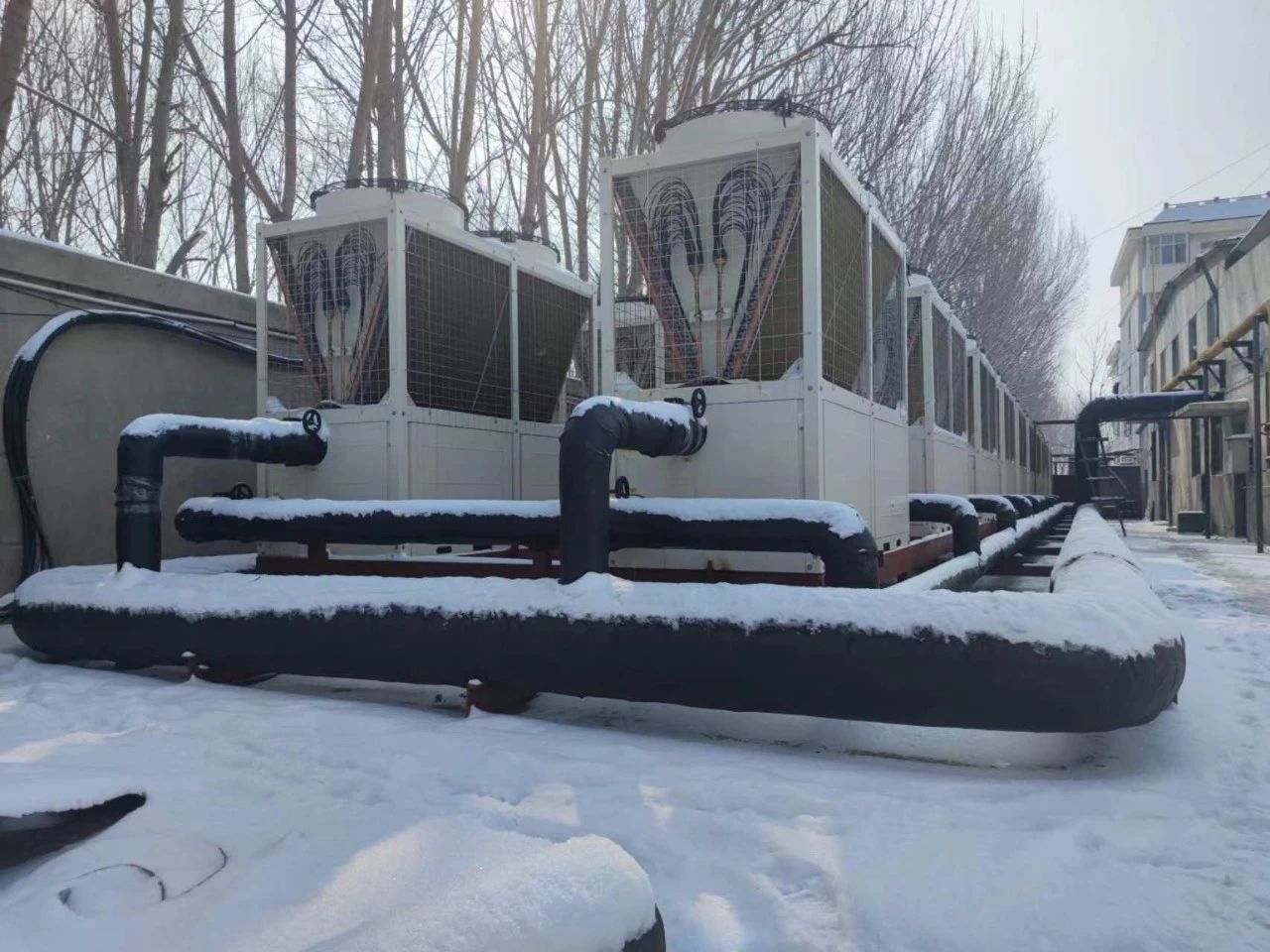 为什么九州酷游空气能热泵能在低温环境高效运行呢？